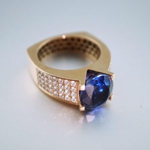 gold rings with blue stone